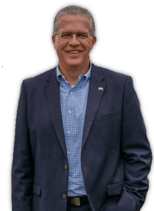 Timothy T. Burtis in a navy jacket and checked shirt.